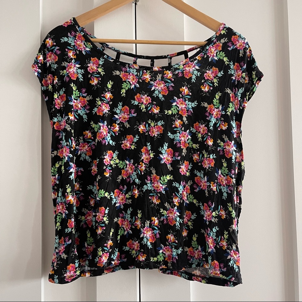 Floral covered soft black top